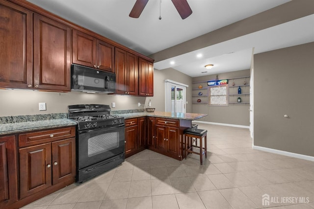 80 Sonora Ave, Iselin, NJ 08830 - kitchen with black appliances, a ceiling fan, a peninsula, light stone counters, and a breakfast bar