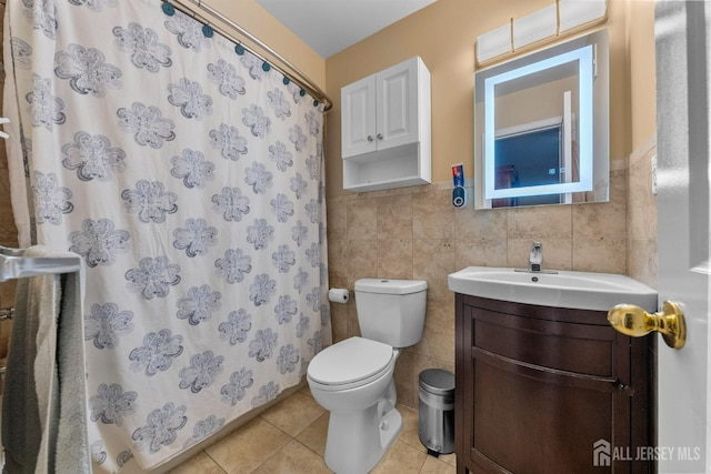 80 Sonora Ave, Iselin, NJ 08830 - full bath with tile walls, vanity, toilet, tile patterned floors, and a shower with curtain