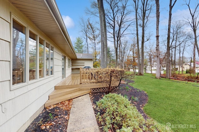 view of yard with a wooden deck