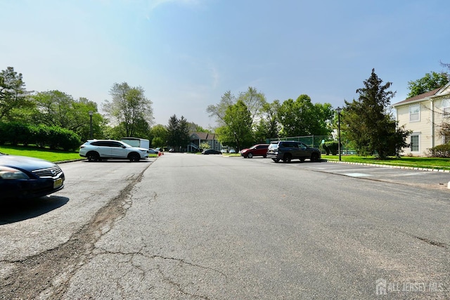 33 Rachel Ct, Franklin Twsp, NJ 08823 - view of asphalt road featuring a residential view