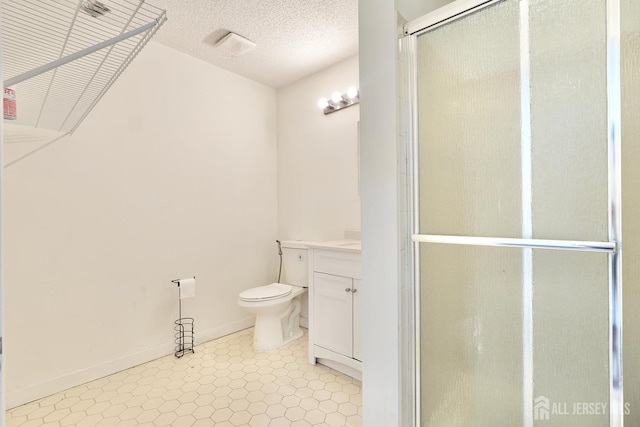 33 Rachel Ct, Franklin Twsp, NJ 08823 - bathroom with a stall shower, vanity, toilet, and a textured ceiling