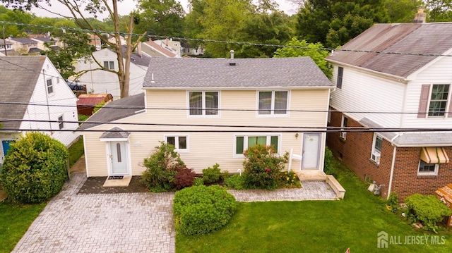 314 Benjamin Ave, Iselin, NJ 08830 - view of front facade with a front lawn