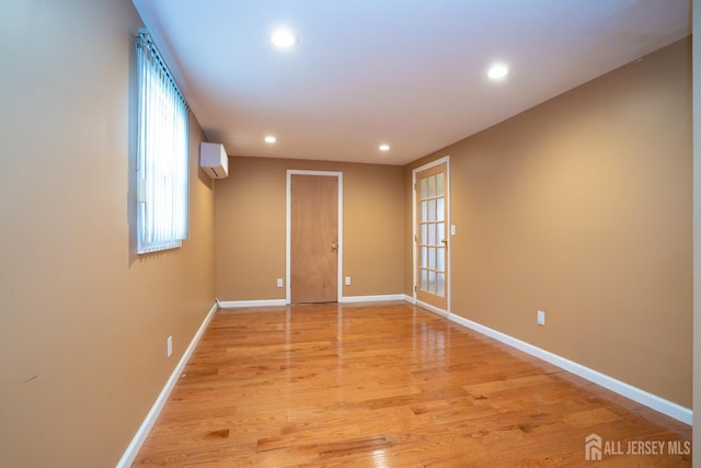 314 Benjamin Ave, Iselin, NJ 08830 - spare room featuring recessed lighting, a wall unit AC, and light wood-style floors