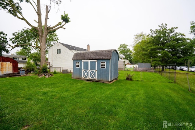 314 Benjamin Ave, Iselin, NJ 08830 - fenced backyard featuring a storage shed