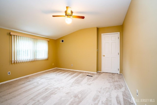 314 Benjamin Ave, Iselin, NJ 08830 - spare room with lofted ceiling, a ceiling fan, and light colored carpet