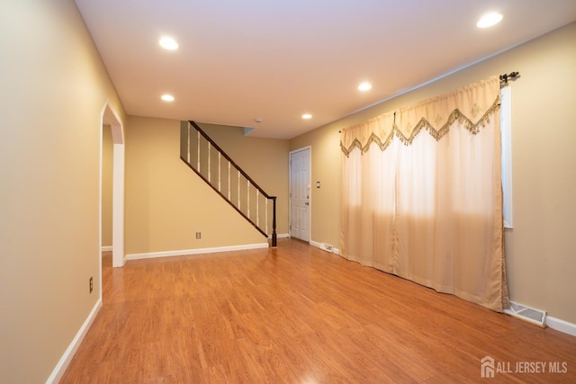 314 Benjamin Ave, Iselin, NJ 08830 - unfurnished room with recessed lighting, light wood finished floors, stairs, and arched walkways