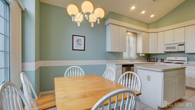 39 Leeds Ln, Monroe, NJ 08831 - kitchen featuring white appliances, white cabinets, light countertops, lofted ceiling, and recessed lighting