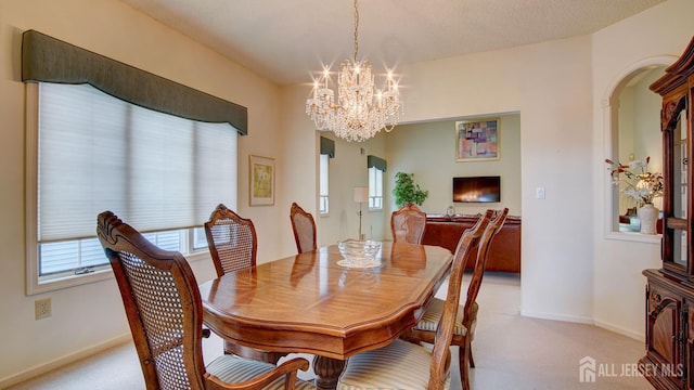 39 Leeds Ln, Monroe, NJ 08831 - dining room with light carpet, a chandelier, and baseboards