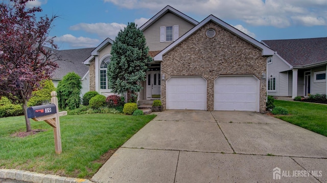 39 Leeds Ln, Monroe, NJ 08831 - view of front of home featuring brick siding, driveway, a front yard, and an attached garage