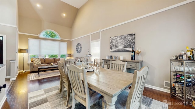 9 Helene St, Old Bridge, NJ 08857 - dining room with high vaulted ceiling, wood finished floors, baseboards, and recessed lighting