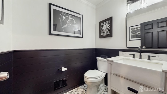 9 Helene St, Old Bridge, NJ 08857 - half bathroom featuring crown molding, toilet, a wainscoted wall, and vanity