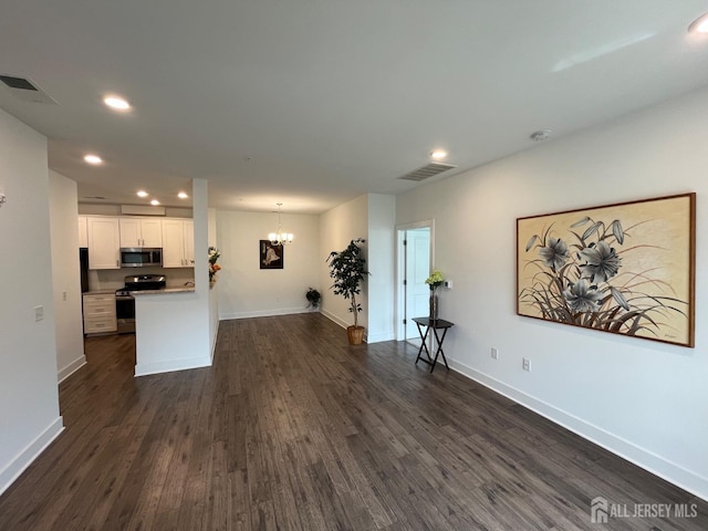 812 Stiller Ln, Monroe, NJ 08831 - living area featuring a chandelier, recessed lighting, dark wood-style floors, and baseboards