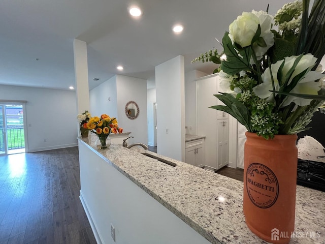 812 Stiller Ln, Monroe, NJ 08831 - kitchen with a sink, dark wood finished floors, white cabinets, light stone counters, and baseboards