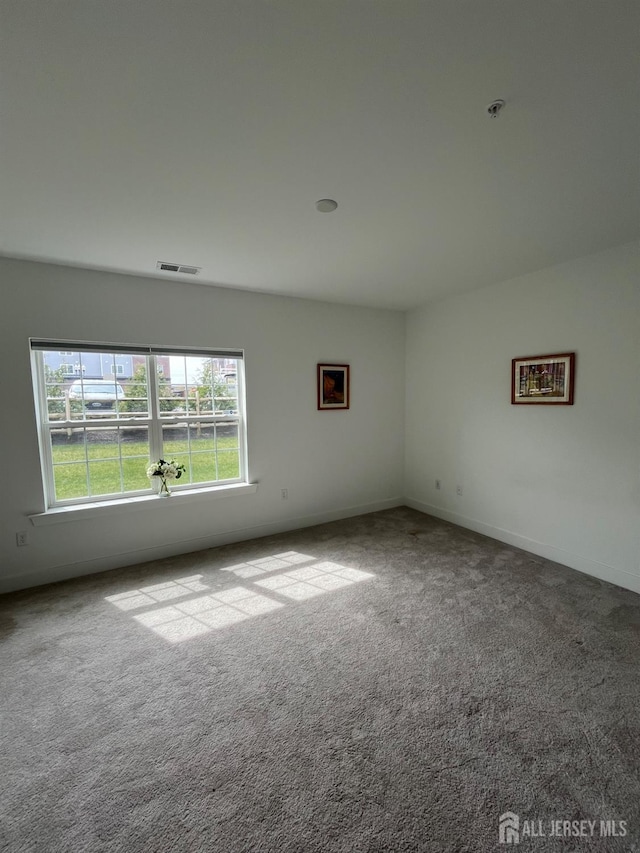812 Stiller Ln, Monroe, NJ 08831 - carpeted empty room with fire sprinkler in ceiling and baseboards
