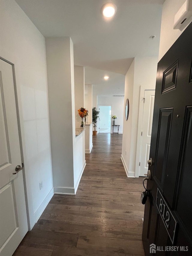 812 Stiller Ln, Monroe, NJ 08831 - hall featuring dark wood-style flooring, baseboards, and recessed lighting