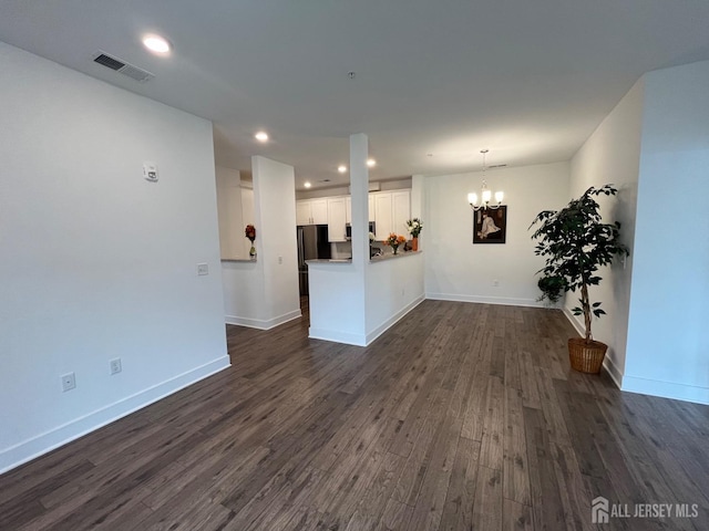 812 Stiller Ln, Monroe, NJ 08831 - unfurnished living room with dark wood finished floors, baseboards, a chandelier, and recessed lighting
