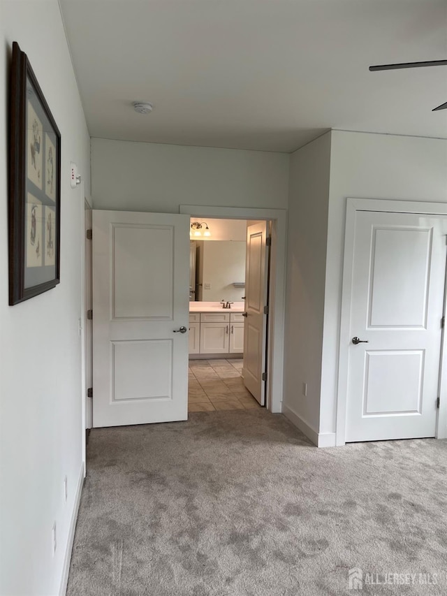 812 Stiller Ln, Monroe, NJ 08831 - unfurnished bedroom featuring carpet floors, ensuite bath, and baseboards