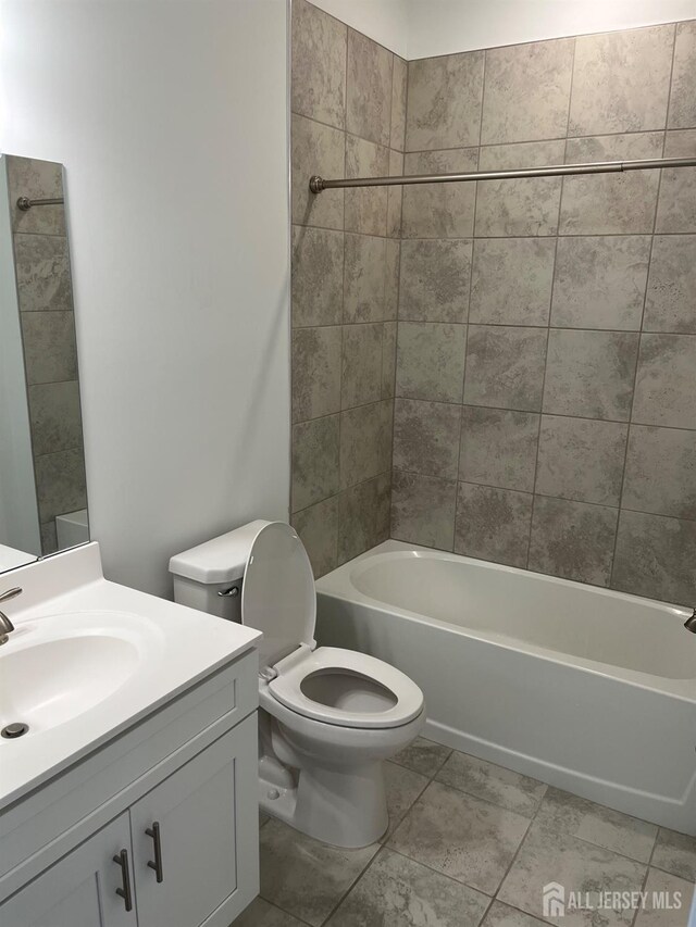 812 Stiller Ln, Monroe, NJ 08831 - bathroom with toilet, vanity,  shower combination, and tile patterned flooring