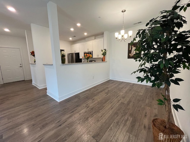 812 Stiller Ln, Monroe, NJ 08831 - unfurnished living room with dark wood-style floors, baseboards, recessed lighting, and a chandelier