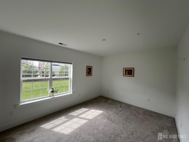 812 Stiller Ln, Monroe, NJ 08831 - carpeted empty room with baseboards