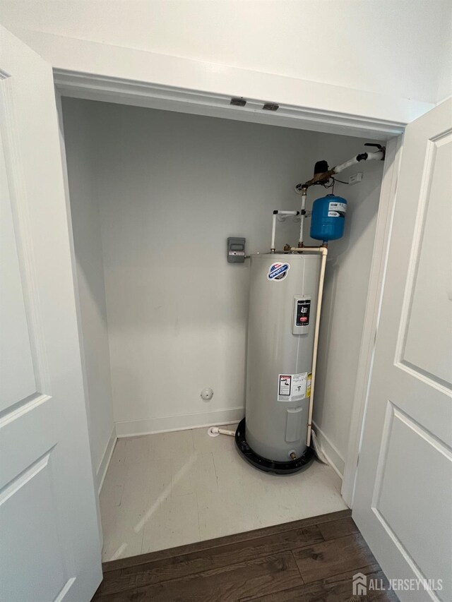 812 Stiller Ln, Monroe, NJ 08831 - utility room featuring electric water heater