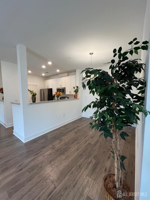 812 Stiller Ln, Monroe, NJ 08831 - living area featuring recessed lighting, dark wood-type flooring, and baseboards