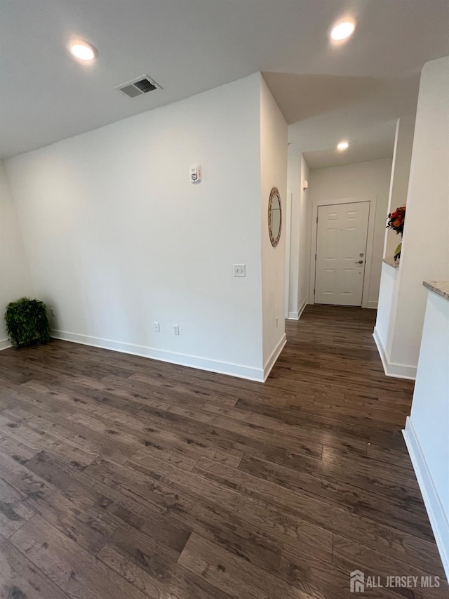 812 Stiller Ln, Monroe, NJ 08831 - empty room with dark wood-style flooring, baseboards, and recessed lighting