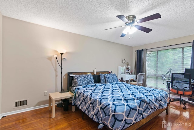 320 Willowbrook Dr, North Brunswick, NJ 08902 - bedroom with wood finished floors, a textured ceiling, and ceiling fan
