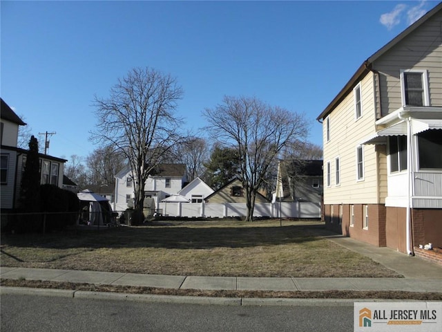 5 E Kupsch St, Sayreville, NJ 08872 - view of asphalt road featuring a residential view
