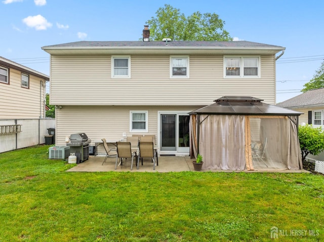 44 Pleasant Ave, Iselin, NJ 08830 - back of property featuring a gazebo, a patio, and a chimney
