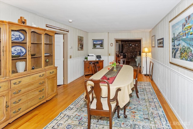 75 Brown Rd, Howell, NJ 07731 - dining space with light wood finished floors and a decorative wall
