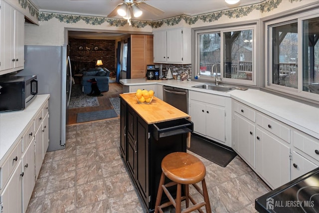 75 Brown Rd, Howell, NJ 07731 - kitchen featuring black microwave, dishwasher, white cabinetry, and ceiling fan