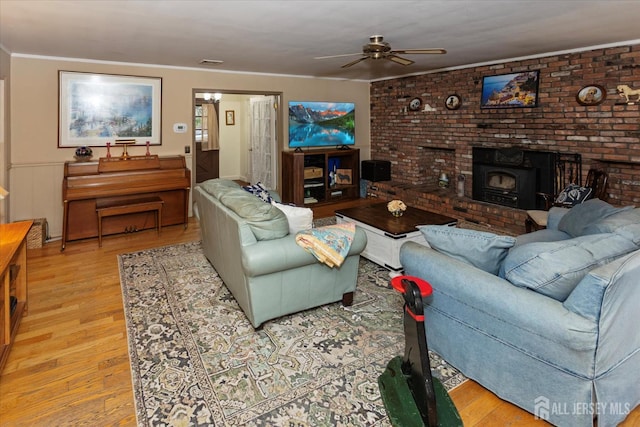 75 Brown Rd, Howell, NJ 07731 - living room with ceiling fan, light wood-type flooring, crown molding, and a wainscoted wall