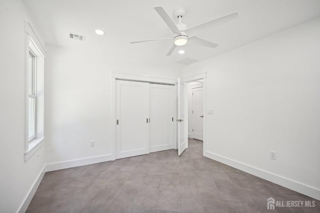 unfurnished bedroom with recessed lighting, a closet, visible vents, and baseboards