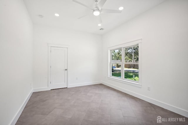 spare room featuring ceiling fan