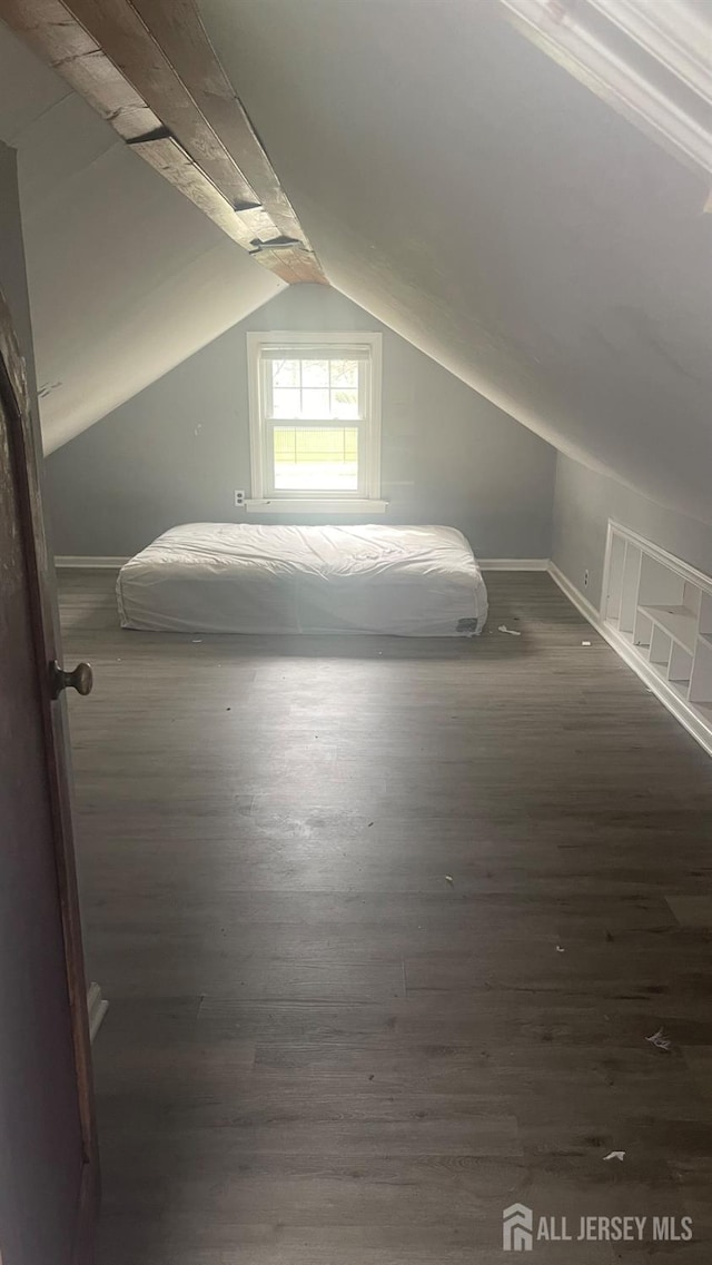 144 Inman Ave, Colonia, NJ 07067 - additional living space featuring wood finished floors, lofted ceiling, and baseboards