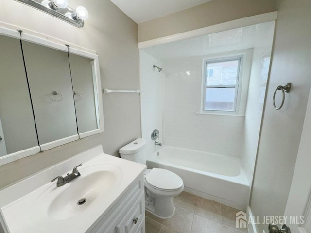 bathroom with toilet, bathtub / shower combination, tile patterned flooring, and vanity