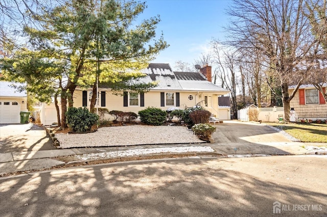 view of front of home featuring a garage