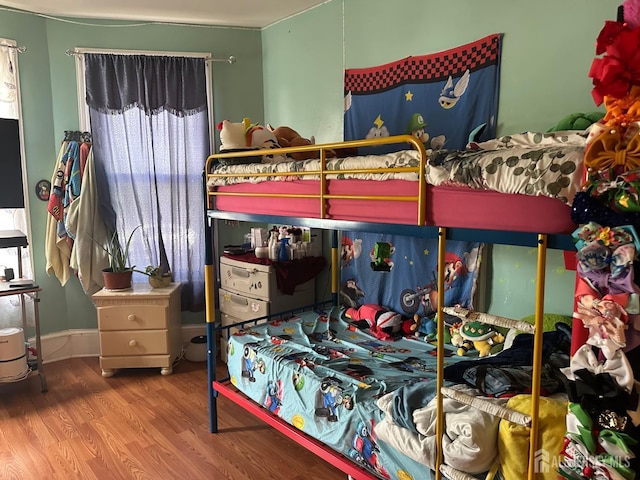 290 Redmond St, New Brunswick, NJ 08901 - bedroom featuring wood finished floors and multiple windows