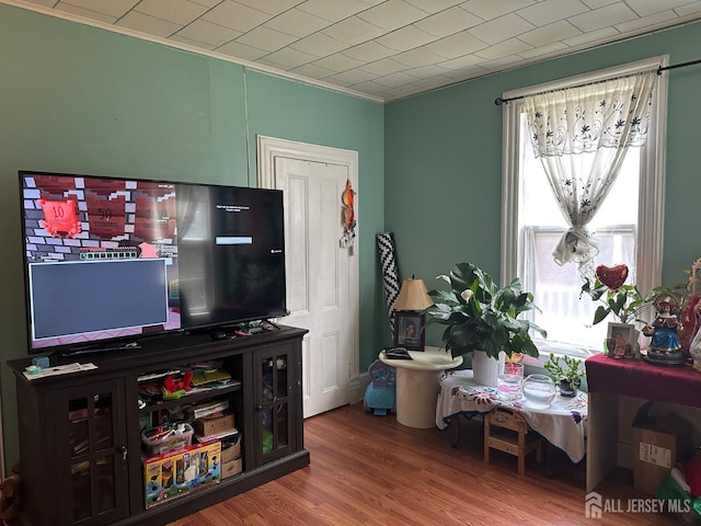 290 Redmond St, New Brunswick, NJ 08901 - living area with wood finished floors and crown molding