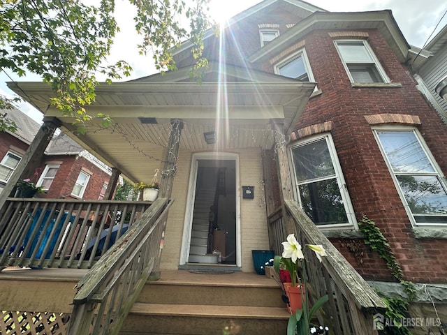290 Redmond St, New Brunswick, NJ 08901 - property entrance featuring brick siding