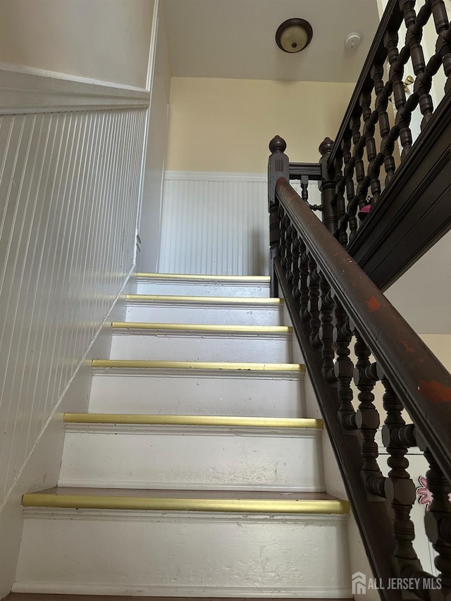 290 Redmond St, New Brunswick, NJ 08901 - stairway featuring a wainscoted wall