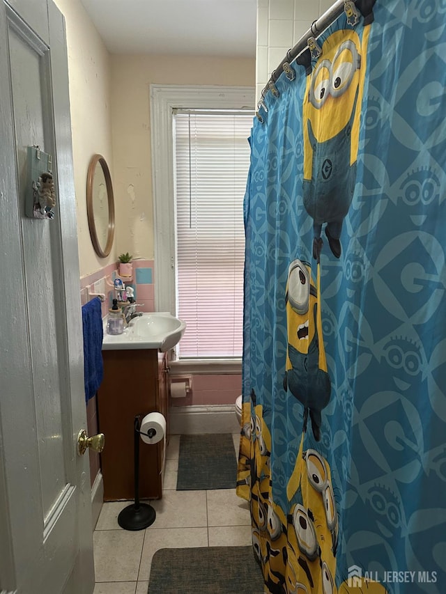290 Redmond St, New Brunswick, NJ 08901 - full bathroom with vanity, tile patterned flooring, and a shower with shower curtain