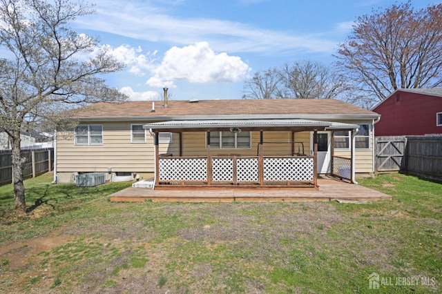 back of property featuring a deck