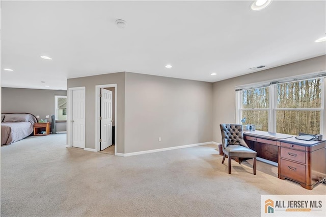 office area featuring light carpet, baseboards, and recessed lighting