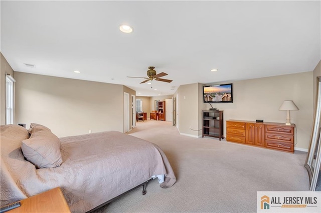 bedroom featuring light carpet, baseboards, recessed lighting, and a ceiling fan