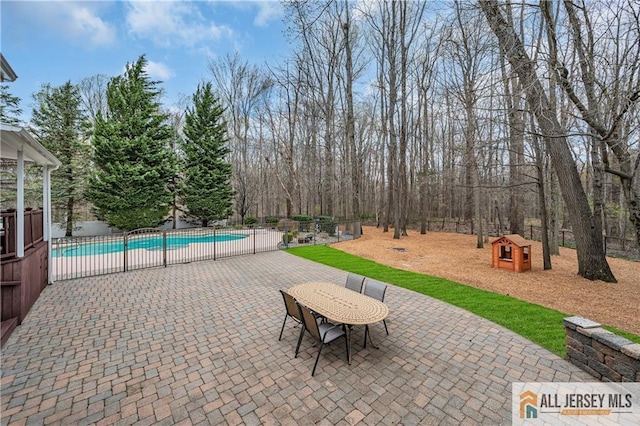 view of patio / terrace featuring fence