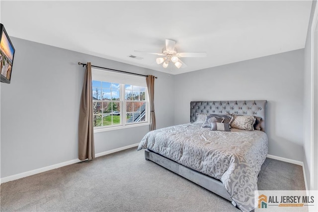 bedroom with carpet floors, baseboards, and ceiling fan