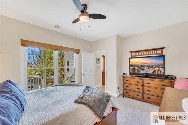carpeted bedroom featuring ceiling fan and baseboards