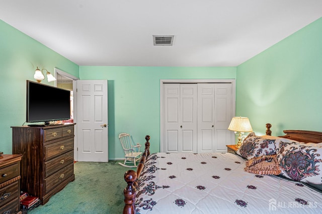 carpeted bedroom featuring a closet and baseboards